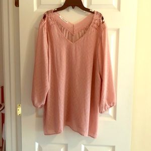 Pink blouse with cutouts